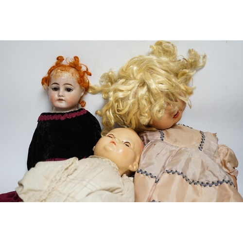 379 - Three dolls; a German Bisque shoulder head doll with sleeping eyes with jointed kid leather body, 46... 