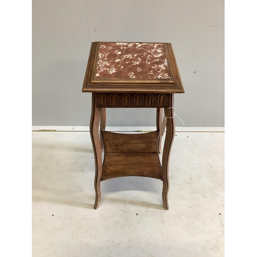 38 - An early 20th century French marble topped beech two tier table, width 33cm, height 76cm