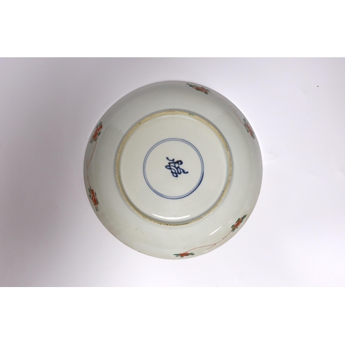 408 - A Chinese famille verte lotus flower dish, Kangxi period, 23cm diameter