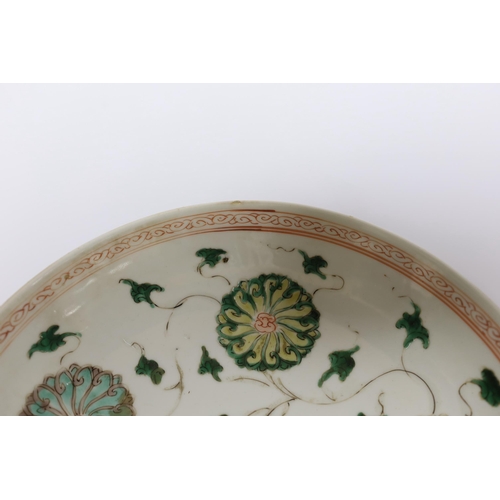 408 - A Chinese famille verte lotus flower dish, Kangxi period, 23cm diameter