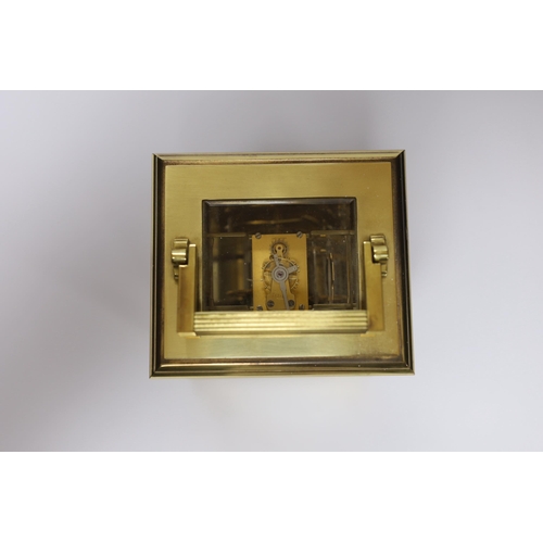 409 - A Garrard & Co. brass cased carriage clock, 15cm