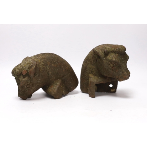 416 - A pair of cast iron bull's head post finials, 13cm