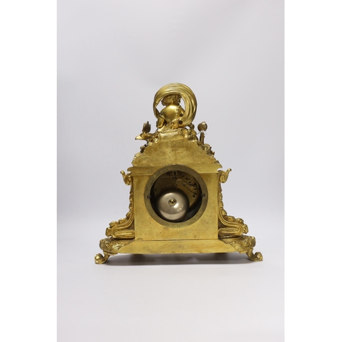 420 - An early 20th century French ormolu mantel clock, with enamel dial, key and pendulum, 31cm