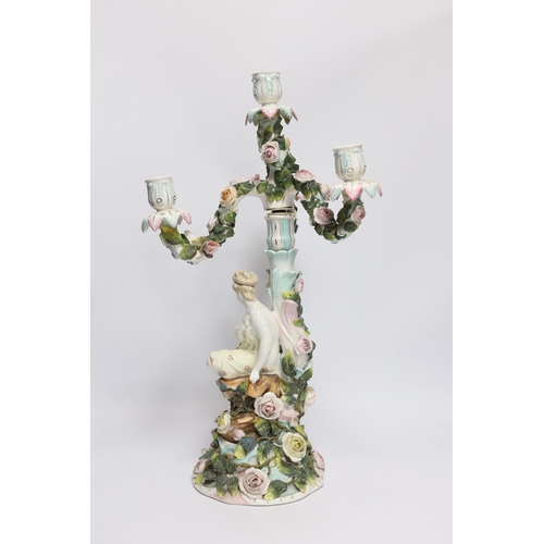 427 - A 19th century Sitzendorf floral encrusted four light figural candelabra, 50cm