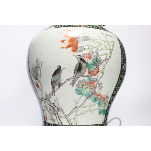 444 - A Chinese famille verte porcelain baluster vase and cover, 19th century, decorated with birds amongs... 