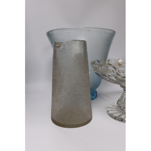 446 - A large heavy cut glass tazza with shaped rim, a tall blue tinted textured vase, height 31.5cm and a... 