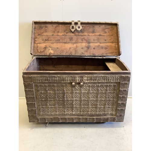 45 - An Indian iron bound domed hardwood trunk, width 104cm, depth 62cm, height 71cm