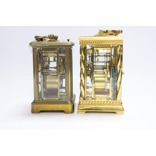 460 - A French gilt brass cased carriage clock with twisted column supports, together with a further carri... 