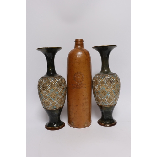 462 - A pair of Doulton Lambeth vases, three jars, two with covers and a Georg Kreuzberg terracotta bottle... 