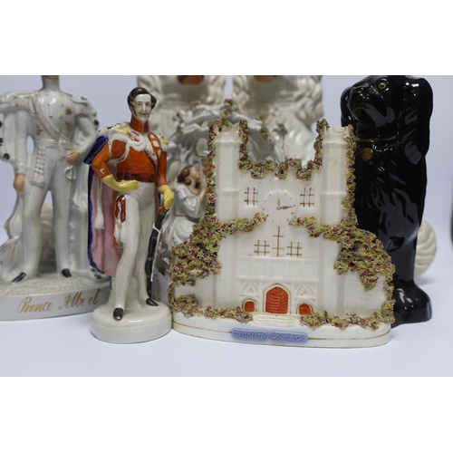 469 - A mixed collection of Staffordshire figure groups to include various spaniels, Prince Albert figure,... 