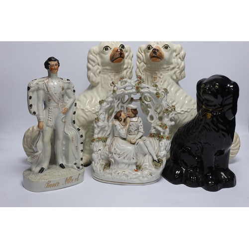 469 - A mixed collection of Staffordshire figure groups to include various spaniels, Prince Albert figure,... 