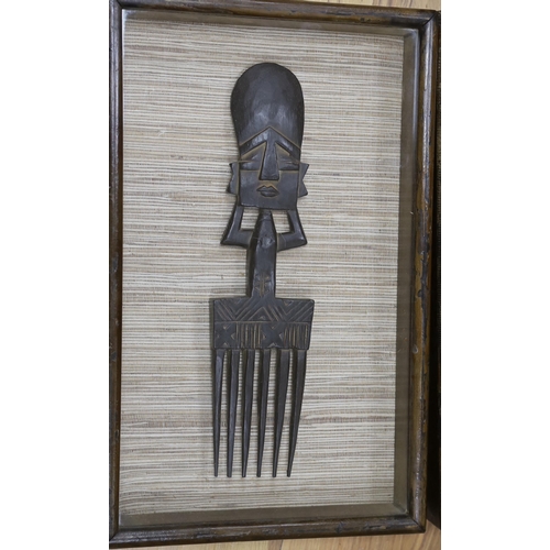 473 - A pair of framed Ashanti combs