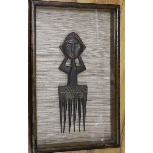 473 - A pair of framed Ashanti combs