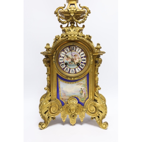 474 - A Sevres style ormolu clock, Miller & Sons with two similar gilt spelter urns, pendulum no key, 44cm... 