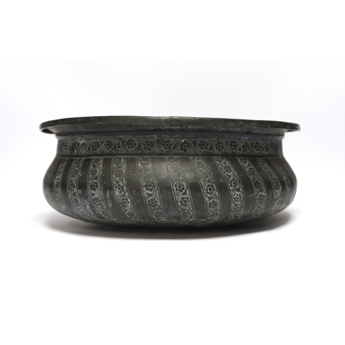 481 - A Middle Eastern patinated copper bowl, 32cm diameter