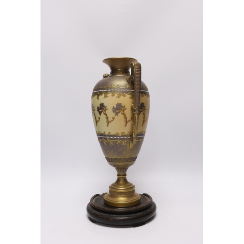 485 - A Royal Worcester blush ivory two handled vase, model no. 1481, with hardwood stand, 31cm