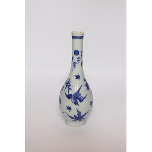 495 - A Chinese blue and white bottle vase, Kangxi period, 22cm