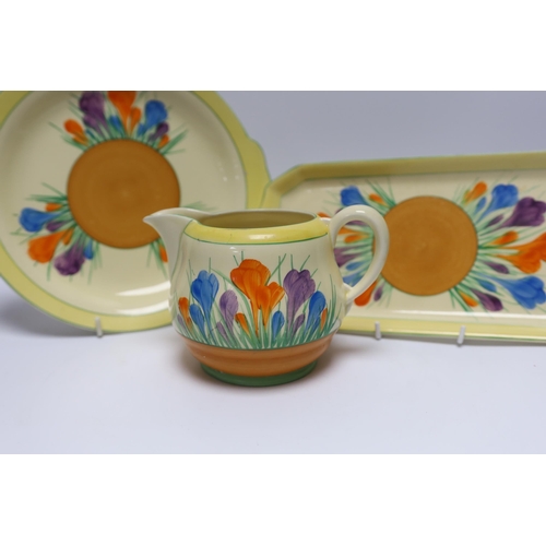 498 - A Clarice Cliff Crocus jug and two dishes, largest 30cm long