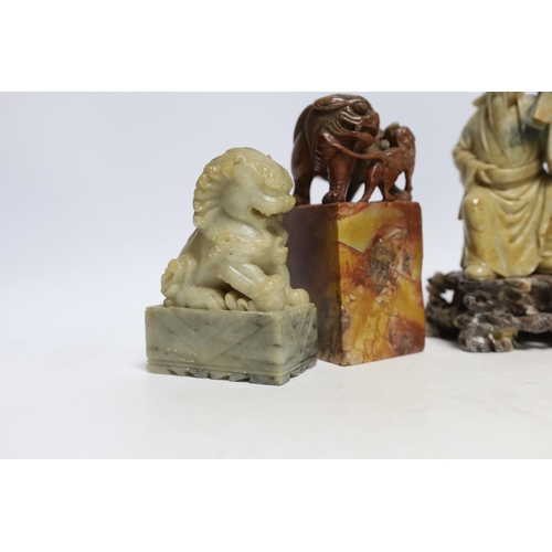 499 - Two Chinese soapstone figures and a pair of Buddhist lion seals, tallest 19.5cm