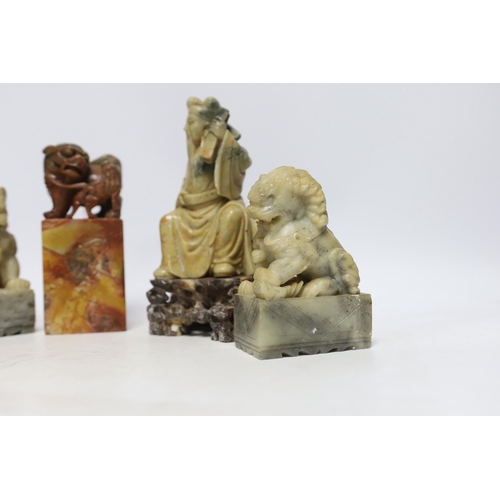 499 - Two Chinese soapstone figures and a pair of Buddhist lion seals, tallest 19.5cm