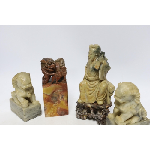 499 - Two Chinese soapstone figures and a pair of Buddhist lion seals, tallest 19.5cm