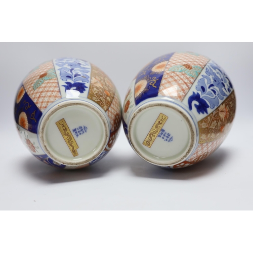 501 - A pair of Japanese Imari vases, by Fukagawa and a pair of Kutani vases, Meiji period, tallest 25cm... 