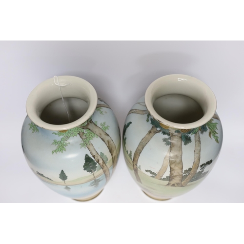 517 - A pair of early 20th century Japanese enamelled porcelain Bijin vases, 32cm