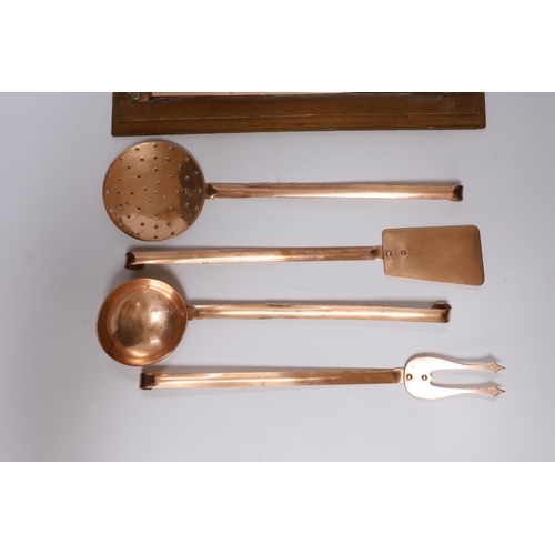 518 - A set of five French copper utensils with hanging rack