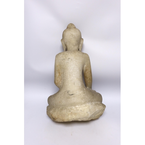 519 - A Burmese carved alabaster model of a seated buddha, 46cm