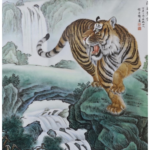 522 - Two Chinese framed enamelled porcelain plaques, one of a tiger and another of two girls, largest 32c... 