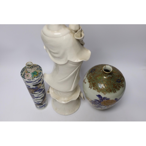 549 - A 19th century Chinese blanc de chine figure of Guanyin, 20th century dragon vase and a Japanese M... 