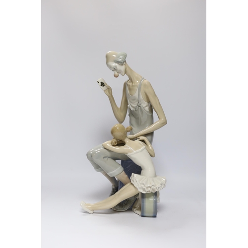 553 - A Lladro figure group of a clown and ballerina, 42cm