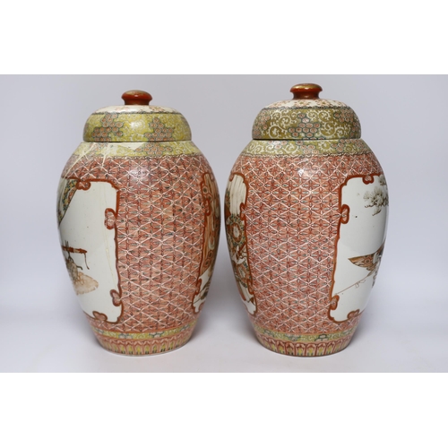 554 - A pair of Japanese Meiji period vases and covers, 31cm (a.f.)