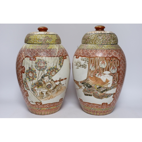 554 - A pair of Japanese Meiji period vases and covers, 31cm (a.f.)