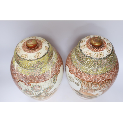 554 - A pair of Japanese Meiji period vases and covers, 31cm (a.f.)