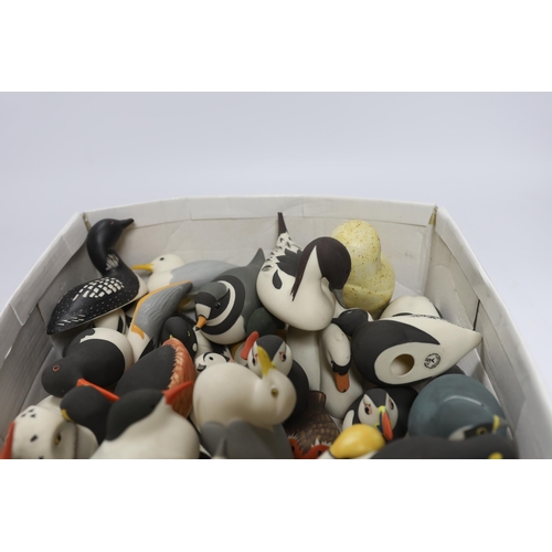 555 - A collection of Isle of Arran ceramic birds