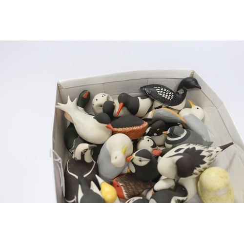 555 - A collection of Isle of Arran ceramic birds