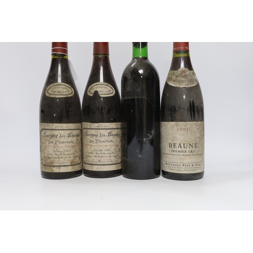 556 - Six bottles of red wine including two bottles of Savigny Les Beaune 1997