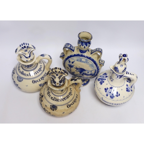 564 - A Delft moonflask and three Delft jugs, largest 22cm