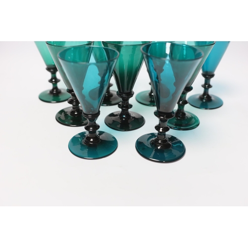 571 - Nine early 19th century green wine glasses, 14cm