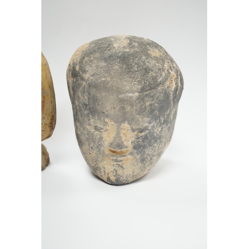 584 - A Chinese grey pottery head and a bust, Han dynasty, tallest 17cm