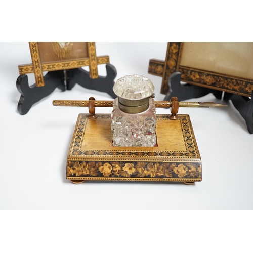 587 - A Tunbridge ware inkstand with cut glass bottle and pen, together with two frames, largest 22.5cm hi... 