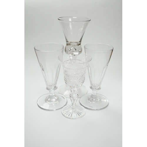 588 - A pair of early 19th century dwarf ale glasses with fluted conical bowls, bladed knop stems and poli... 