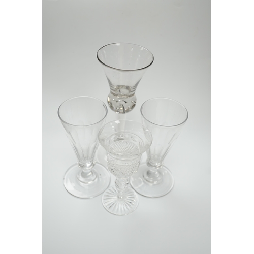 588 - A pair of early 19th century dwarf ale glasses with fluted conical bowls, bladed knop stems and poli... 