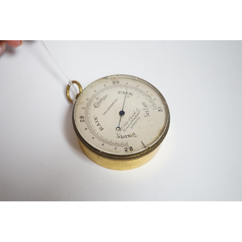 595 - A gilt metal circular pocket barometer by Gallagher and Co., New Bond Street, London (lacks case) an... 