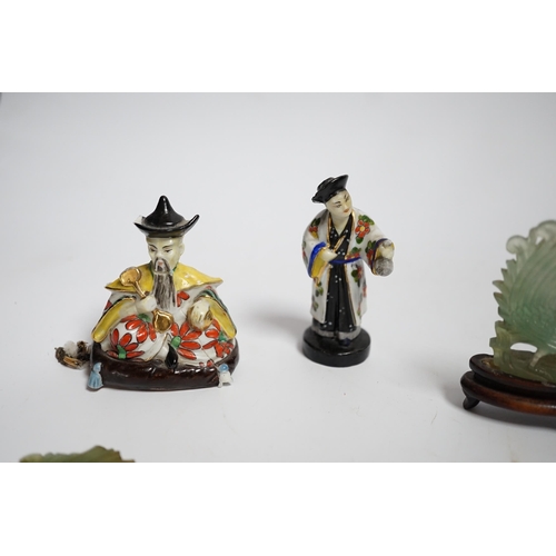 597 - Four Chinese figures, including two jadeite examples, largest 7.5cm wide