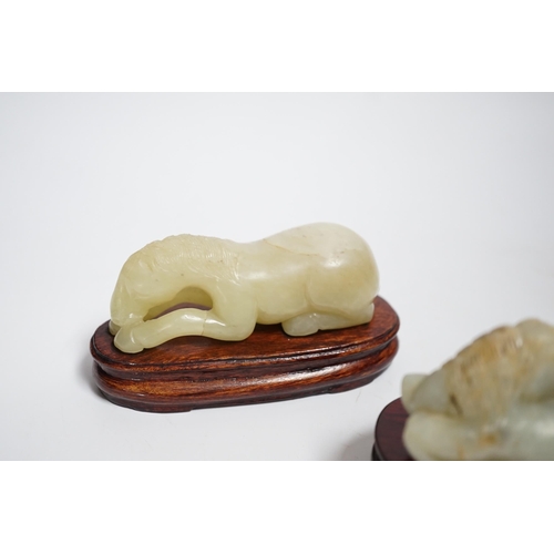 599 - Two Chinese carved jade figures of horses on stands, largest 11cm wide