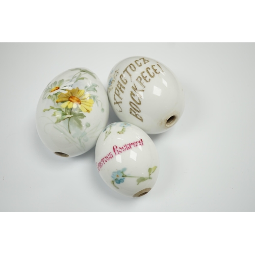 610 - Three Russian porcelain Easter eggs, 19th century, 11cm in length