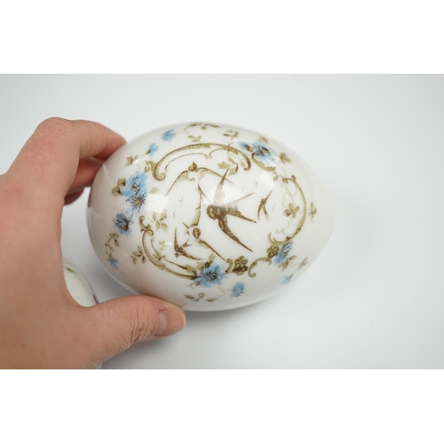 610 - Three Russian porcelain Easter eggs, 19th century, 11cm in length