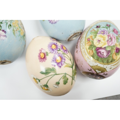 630 - Four Russian porcelain Easter eggs, 19th century, 11cm high